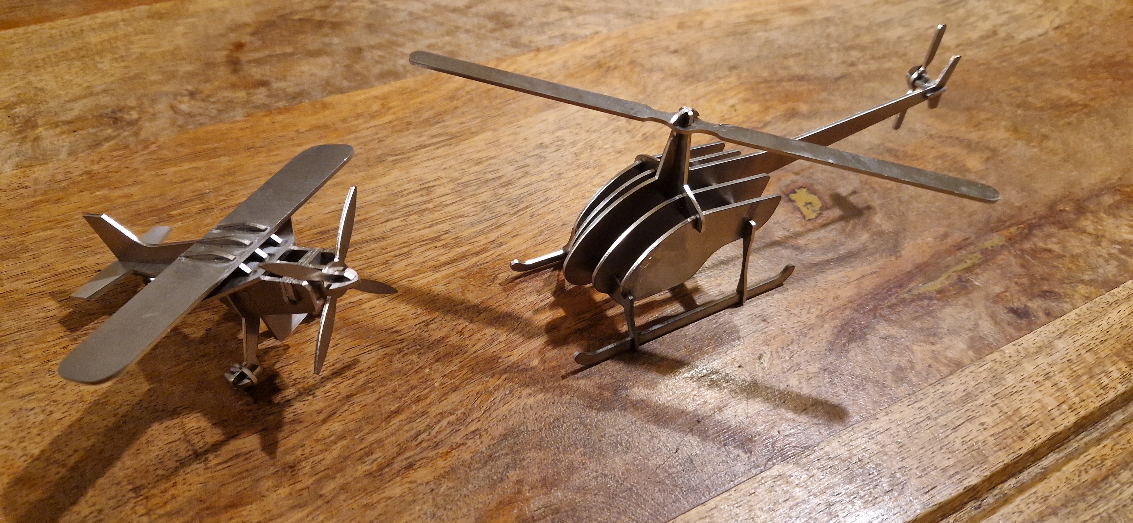 Laser cut metal aircraft and helicopter models