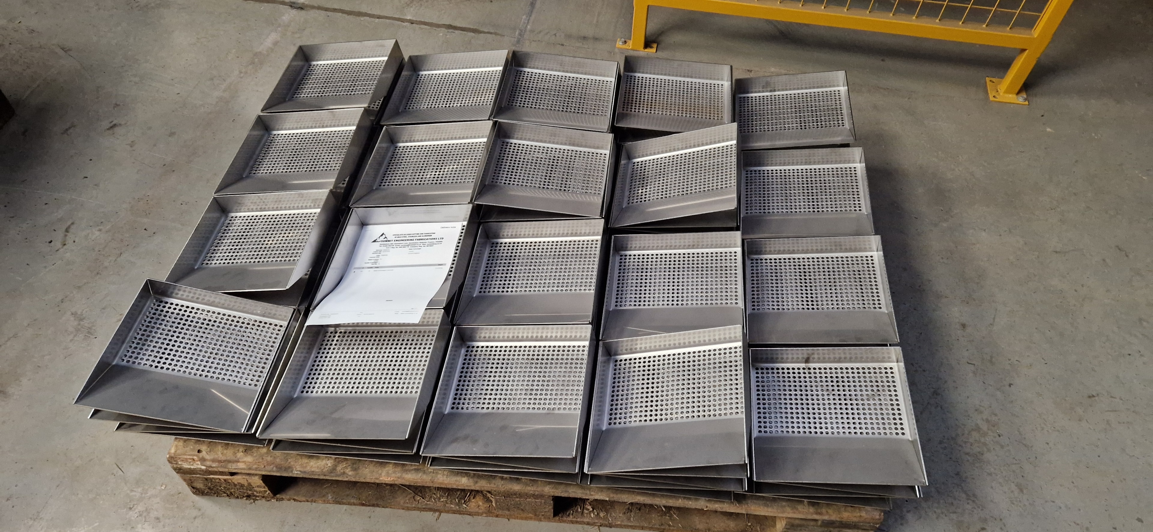 Stainless steel perforated trays on pallet