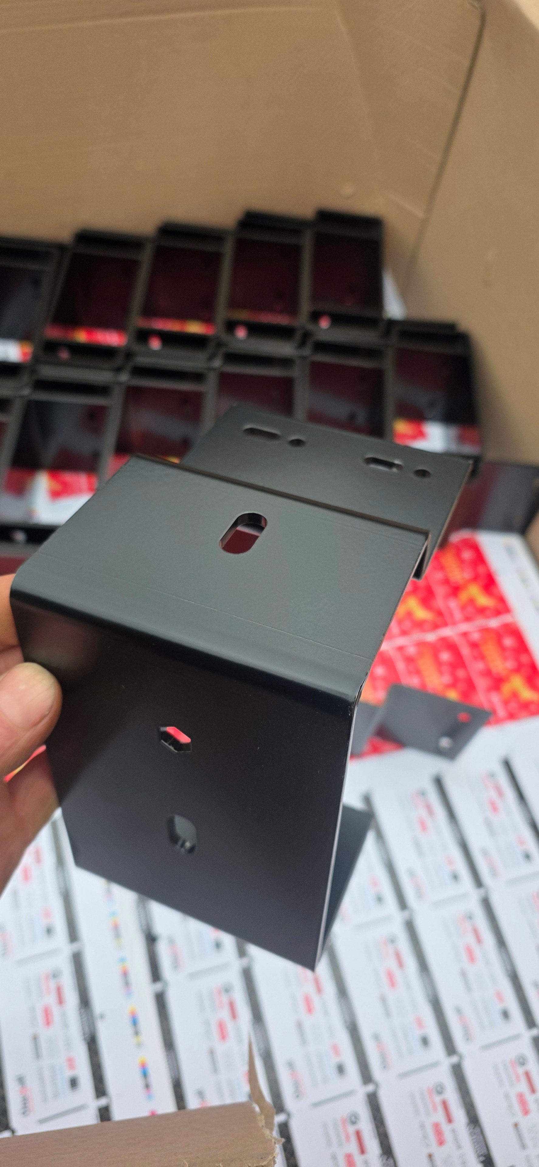 Fabricated black steel bracket assembly